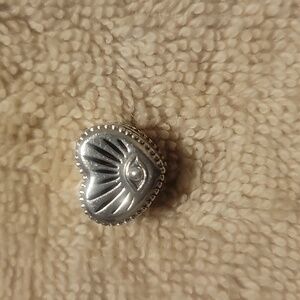 Pandora 925 sterling silver heart charm.